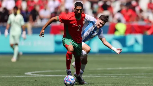 Achraf Hakimi and Julian Alvarez battle for the ball in the Summer Olympics in Paris. (Source: Al Jazeera)