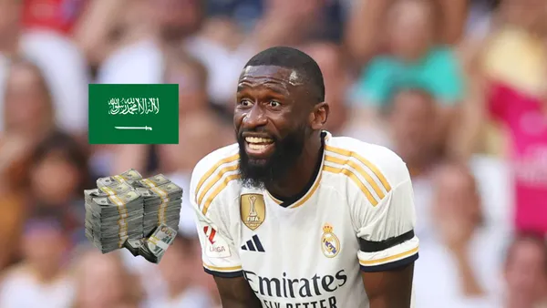 Antonio Rudiger looks in shock with a Real Madrid jersey on while the Saudi Arabia flag and a stack of cash is next to him. (Source: DeadlineDayLive X)