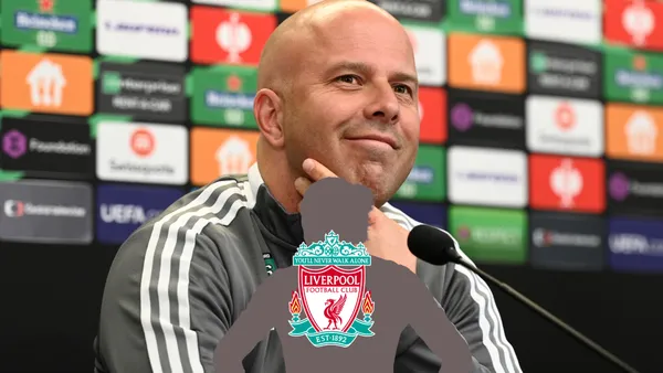 Arne Slot smiles during a press conference for the next Feyenoord match.