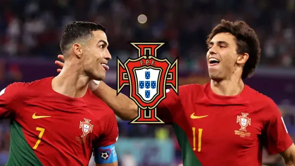 Cristiano Ronaldo and Joao Felix celebrate a goal together while wearing the Portuguese national team jerseys; the Portugal national team logo is in the middle.