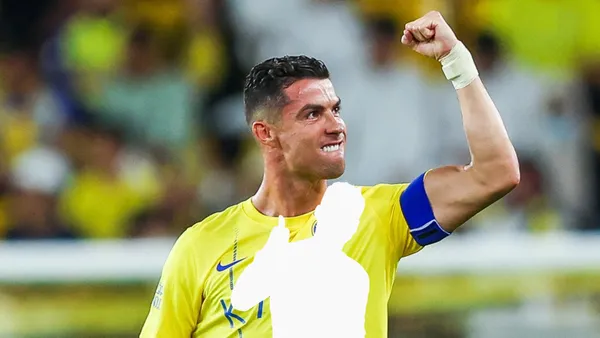 Cristiano Ronaldo celebrates his goal with Al Nassr with his close fist up in the air.