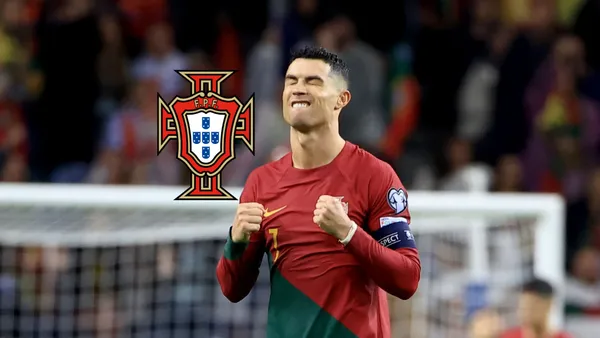 Cristiano Ronaldo closes his eyes in excitement while he wears the Portugal jersey; the Portugal national team badge is next to him.