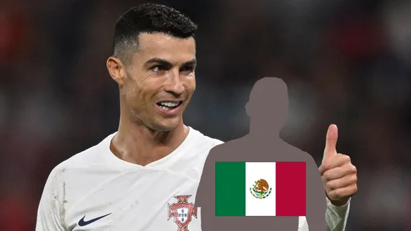 Cristiano Ronaldo happy with the thumbs up while wearing the away Portugal jersey.