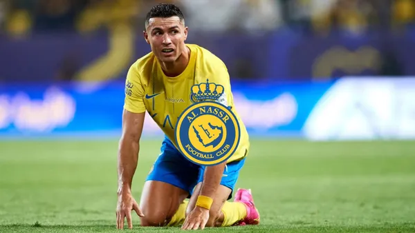 Cristiano Ronaldo on the ground upset while playing for Al Nassr.