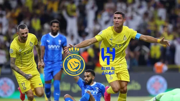 Cristiano Ronaldo sticks his arms out with Al Nassr against Al Hilal.