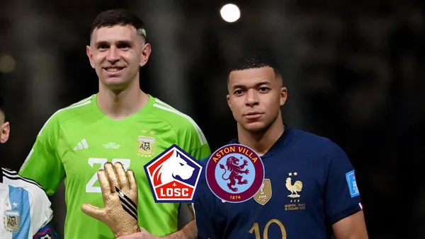 Emiliano Martinez and Kylian Mbappé pose for a picture after the 2022 World Cup final.