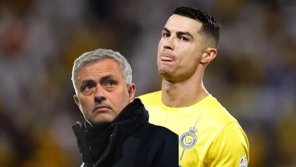 Jose Mourinho focuses with Al Nassr while Jose Mourinho looks up.