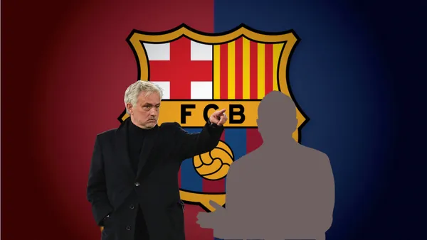 Jose Mourinho points to one of his players as a Roma coach.