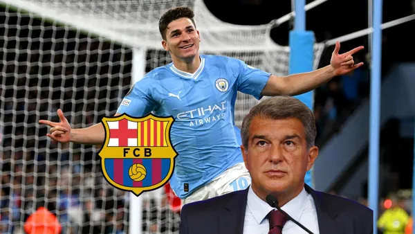 Julian Alvarez does his trademark celebration while Joan Laporta looks up and next to him is the FC Barcelona badge. (Source: Getty Images)