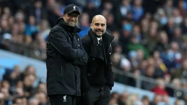 Klopp and Guardiola | Photo: @PremierLeague