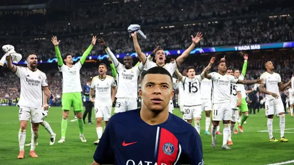 Kylian Mbappé looks up wearing a PSG shirt while the Real Madrid team celebrate a win together at the Santiago Bernabeu.