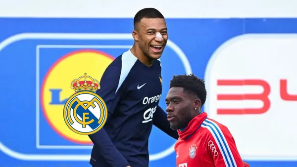 Kylian Mbappé smiles during training while Alphonso Davies looks focused; the Real Madrid badge is next to him. (Source: Madrid Zone X)