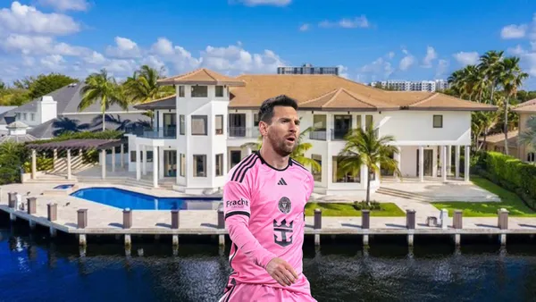 Lionel Messi focused in an Inter Miami game with the background of his house in Miami.