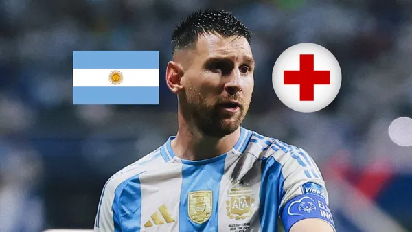 Lionel Messi looks concerned while he wears the Argentina jersey; the Argentina flag and the injury cross is next to him. (Source: Messi Xtra X)