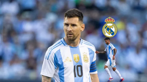 Lionel Messi stares while wearing the Argentina jersey and Cuti Romero runs with the Argentina jersey on, the Real Madrid badge is above him.