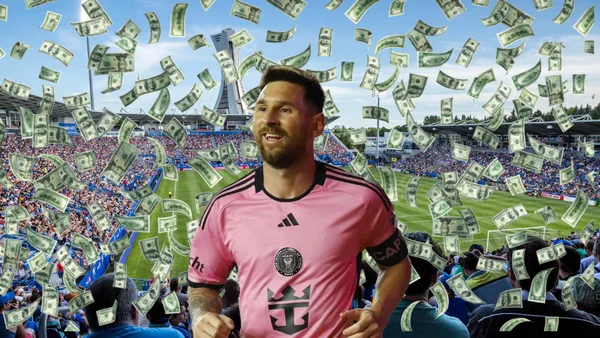 Lionel Messi while he is wearing an Inter Miami shirt with the background of the CF Montreal stadium.