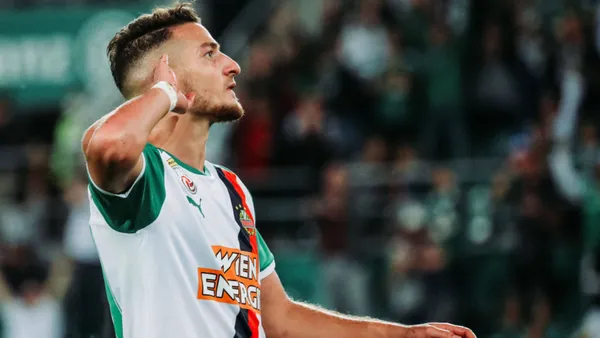 The Austrian striker plays for Rapid Vienna of the Austrian Bundesliga and is an international with the Austrian national team.