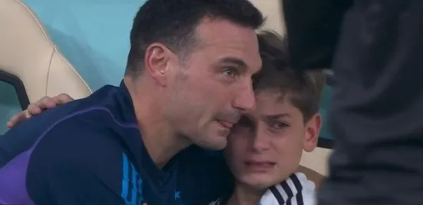 The coach celebrated the victory with his son after qualifying for the World Cup Semifinals in Qatar.