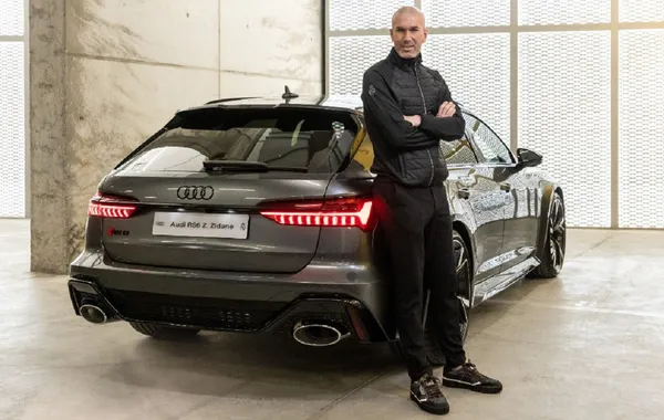 The French coach and a luxury vehicle