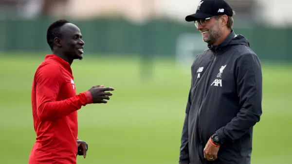 The Senegalese striker would practically have one foot out of the Red club.