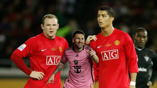 Wayne Rooney and Cristiano Ronaldo are together wearing Manchester United jerseys while Lionel Messi smiles and points while wearing an Inter Miami jersey.