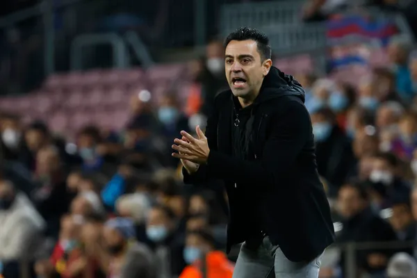 Xavi Hernandez's time at Barcelona began with a derby win over Espanyol but he faces a more tricky match against Benfica in the Champions League.
