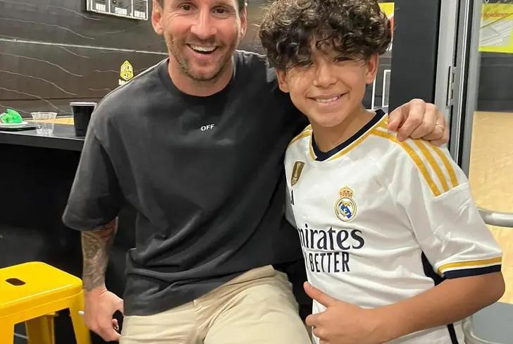 Lionel Messi and a Madrid fan