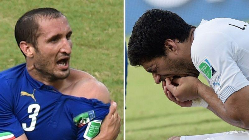 
   Luis Suarez bites Giorgio Chiellini 
 