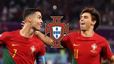 Cristiano Ronaldo and Joao Felix celebrate a goal together while wearing the Portuguese national team jerseys; the Portugal national team logo is in the middle.