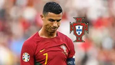 Cristiano Ronaldo looks upset while wearing the Portugal national team jersey and the Portugal national team badge is next to him.
