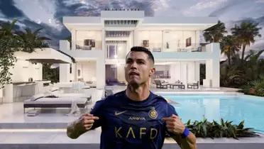 Cristiano Ronaldo points at himself while wearing the Al Nassr jersey and a mansion is behind him.