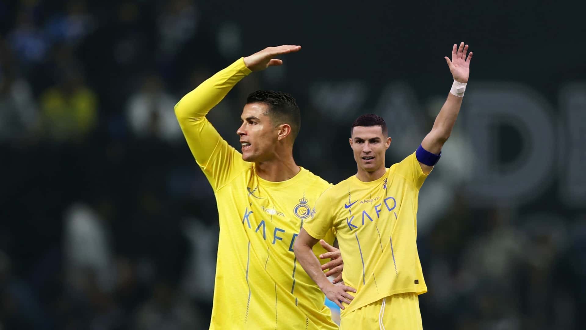Cristiano Ronaldo put his hand up in anger and he also raises his hand with an Al Nassr shirt.
