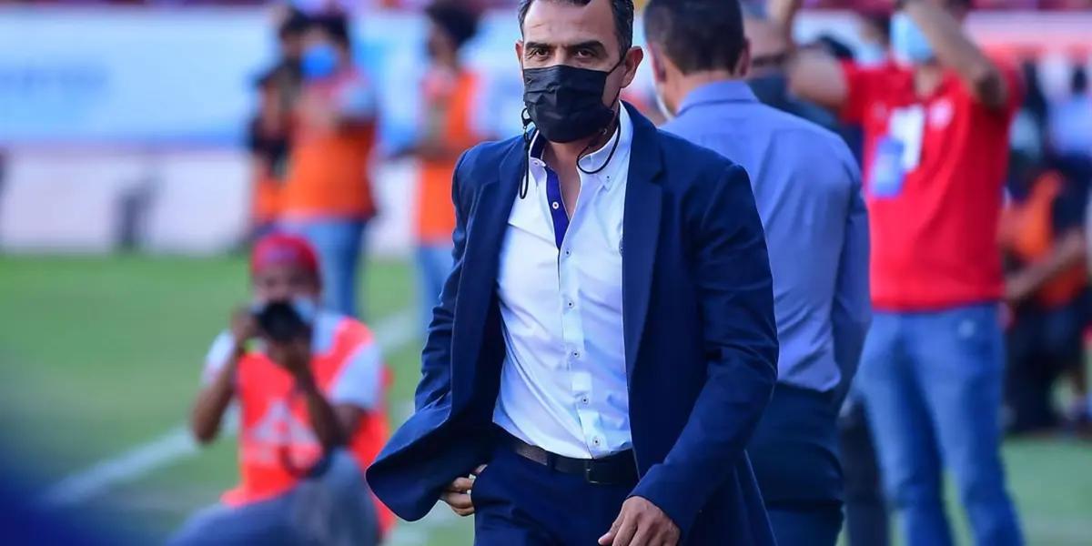 He has coached Chivas for four games.