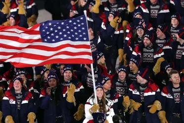 How does the United States of America and Japan compare in how much they pay for each medal at the Olympics?