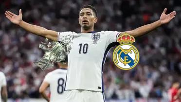 Jude Bellingham does his trademark celebration while the Real Madrid badge and flying money is below him. (Source: James Statman X)