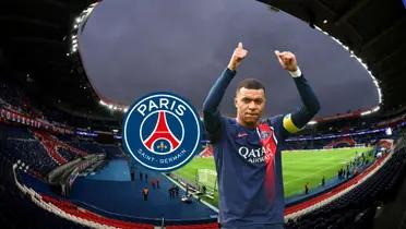 Kylian Mbappé gives two thumbs up to the PSG fans while wearing the PSG jersey.