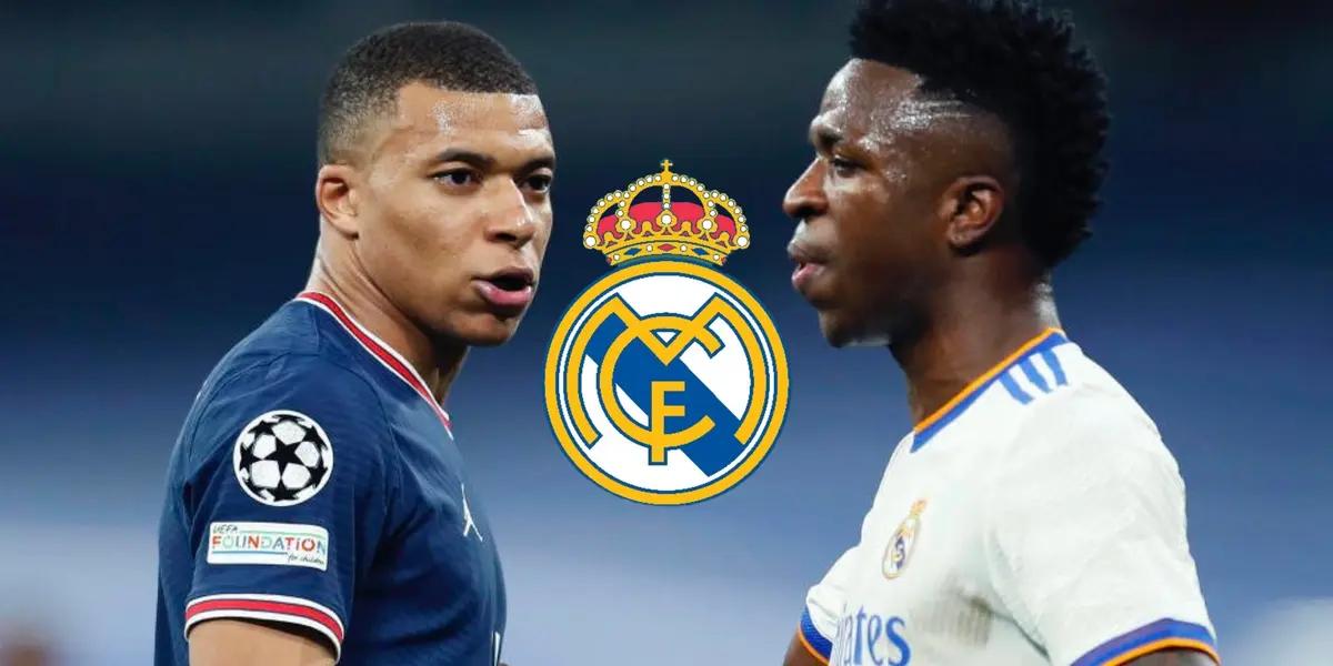 Kylian Mbappé looks at Vinicius Jr. while he is wearing a PSG jersey and the Brazilian is wearing the Real Madrid jersey; the Real Madrid crest is in the middle.