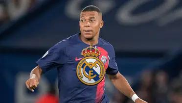 Kylian Mbappé looks to his right wearing a PSG jersey and there is a Real Madrid logo in the middle.