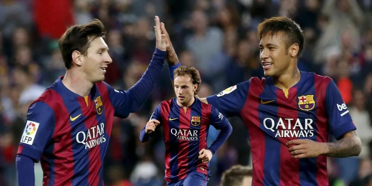 Lionel Messi and Neymar celebrating a goal together at FC Barcelona while Rakitic runs.