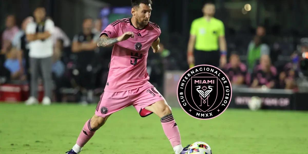Lionel Messi dribbles the ball while wearing the Inter Miami jersey; the Inter Miami badge is next to him.