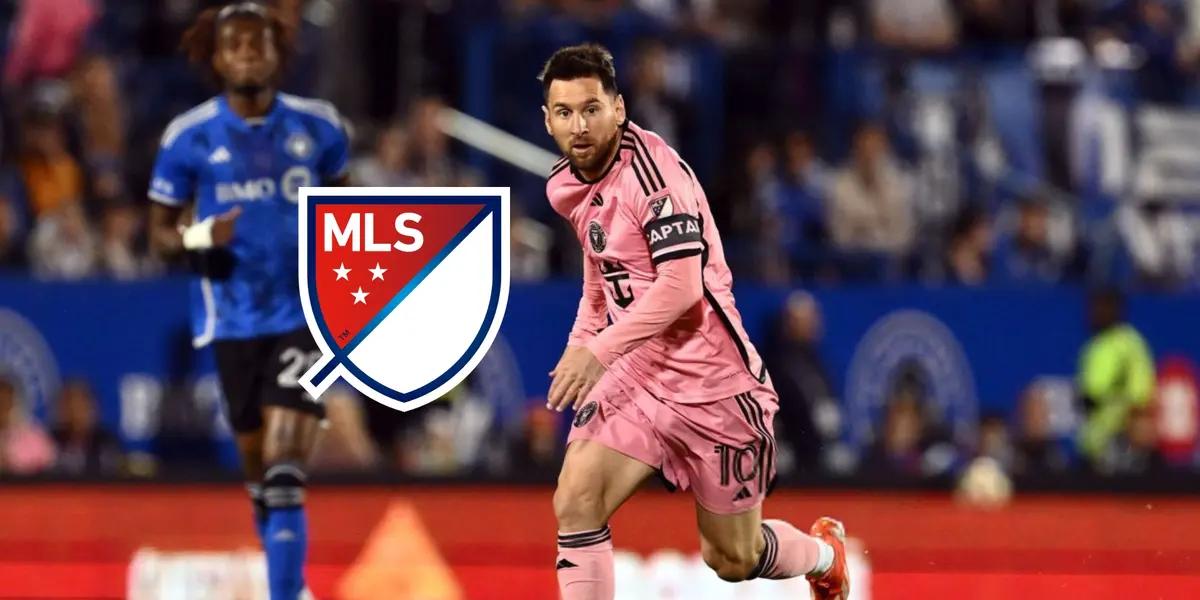 Lionel Messi dribbling on the pitch while wearing the Inter Miami pink kit vs CF Montreal.