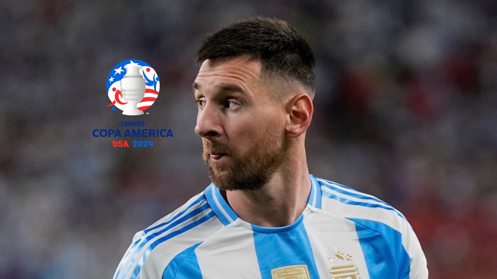 Lionel Messi looks to the side as he wears the Argentina national team jersey while the Copa America logo is next to him. (Source: Messi Xtra X)