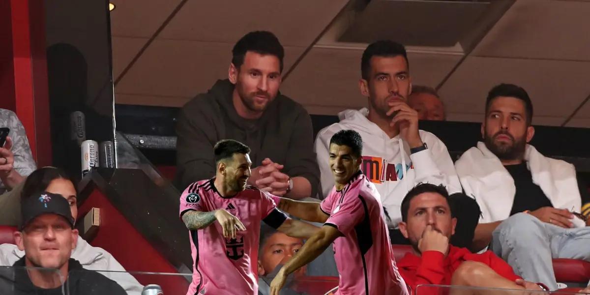 Lionel Messi, Sergio Busquets, and Jordi Alba watching an NBA game in Miami.