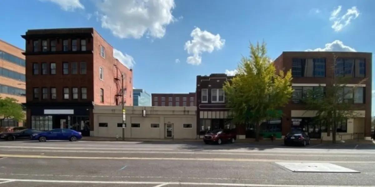 MLS team's plan to demolish buildings near stadium site for parking is is waking up the anger among the neighbors.