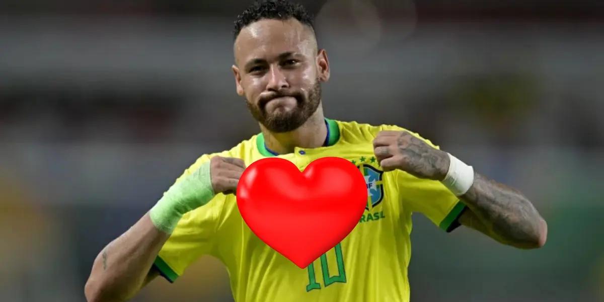 Neymar celebrates his goal fro brazil by showing off his shirt.