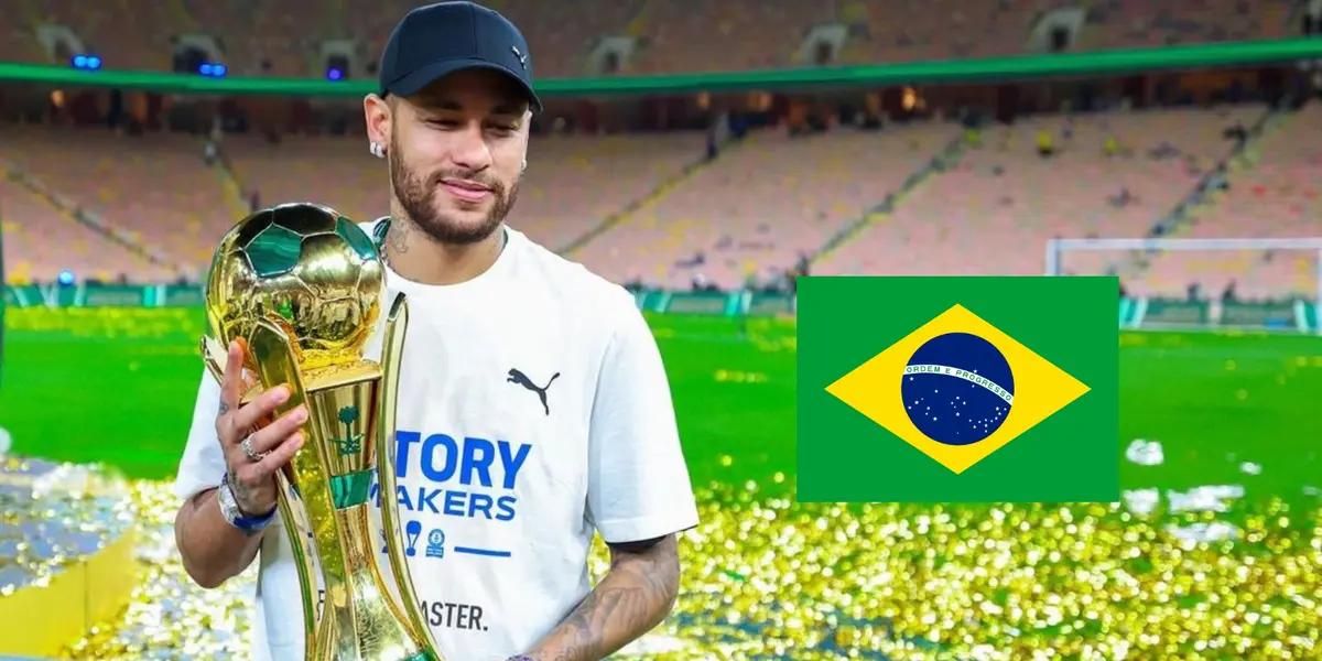 Neymar Jr holds the King's Cup trophy while the Brazil flag is next to him.