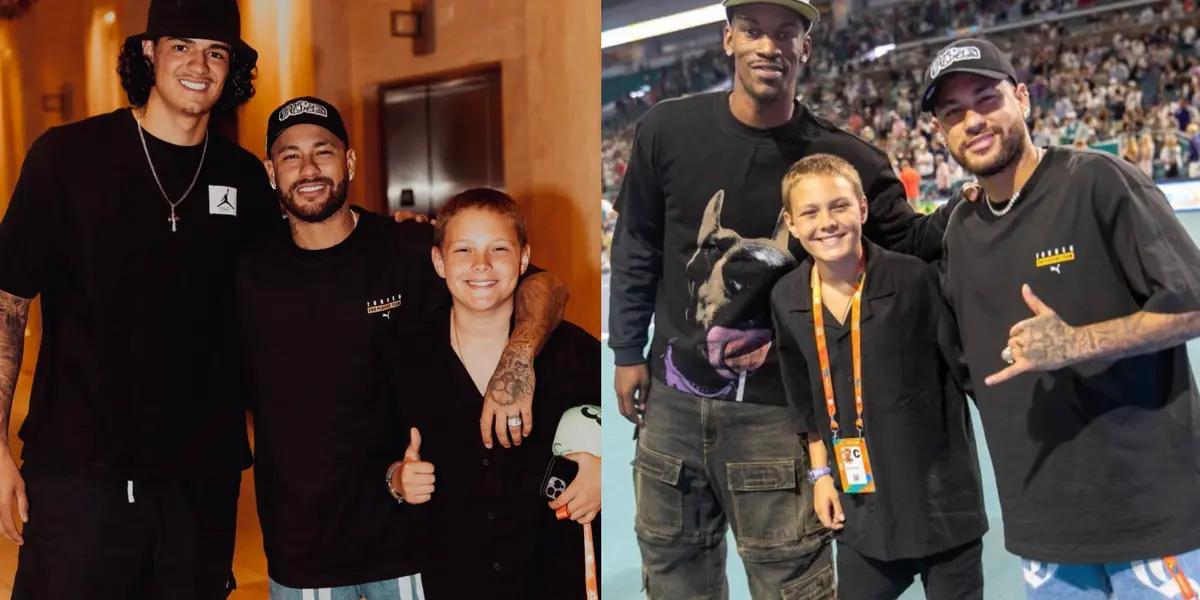 Nyemar takes a picture with Gui Santos and Jimmy Butler.