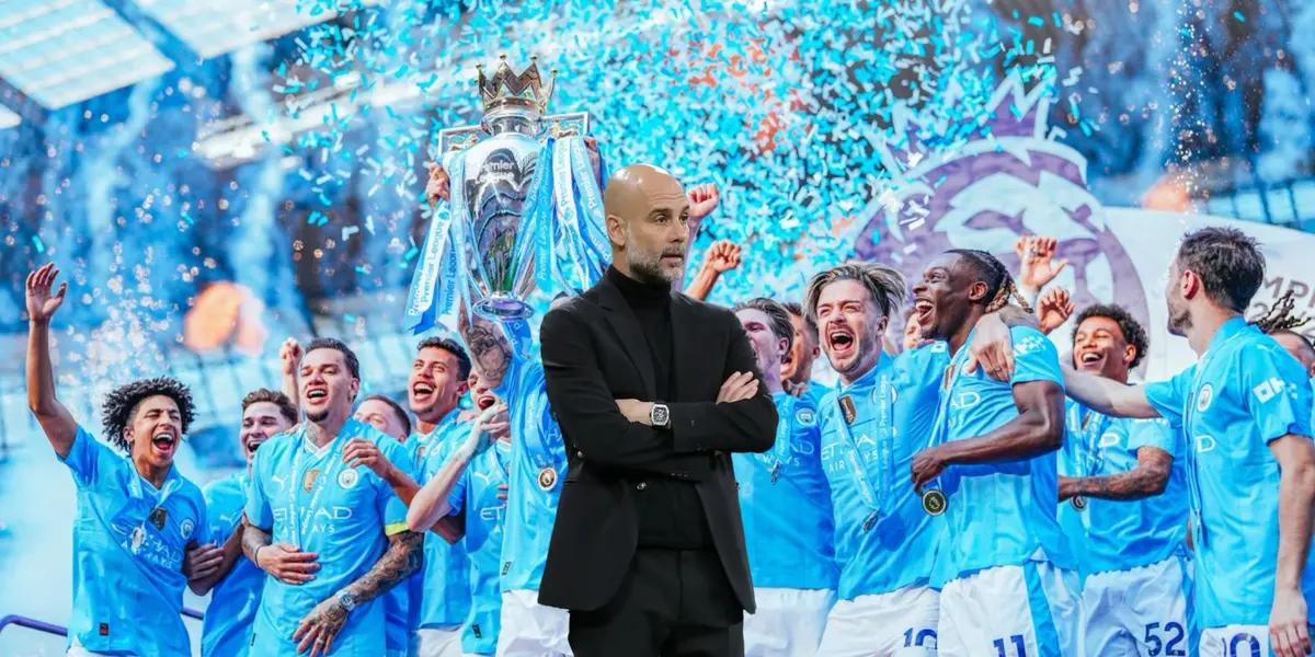 Pep Guardiola crosses his arms looking serious while the Manchester City players celebrate the title with the trophy.