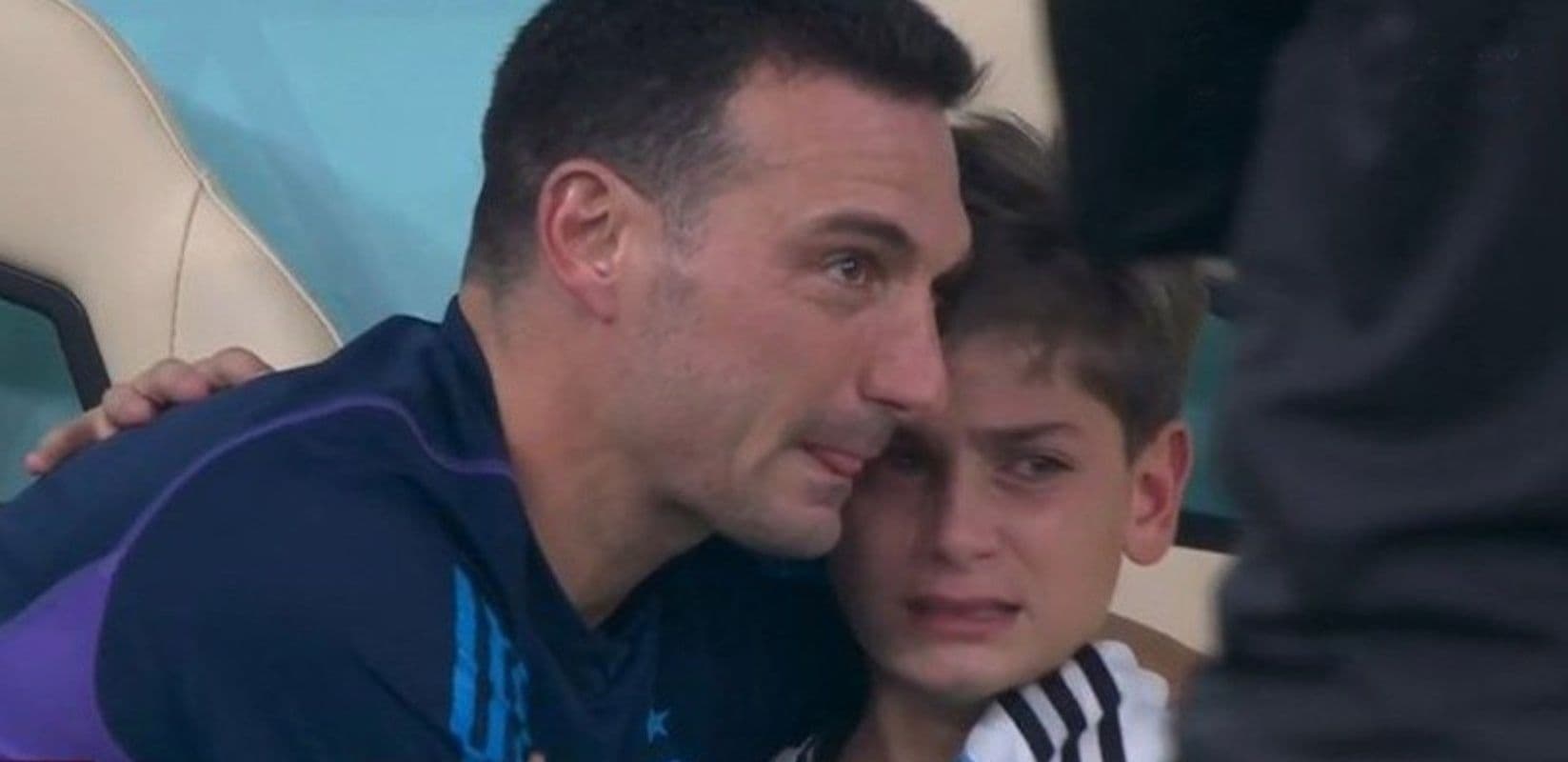 The coach celebrated the victory with his son after qualifying for the World Cup Semifinals in Qatar.
