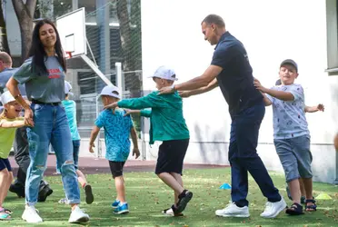 The former footballer visited one of Save the Children's summer schools in Poland where the TeamUp program is developed.